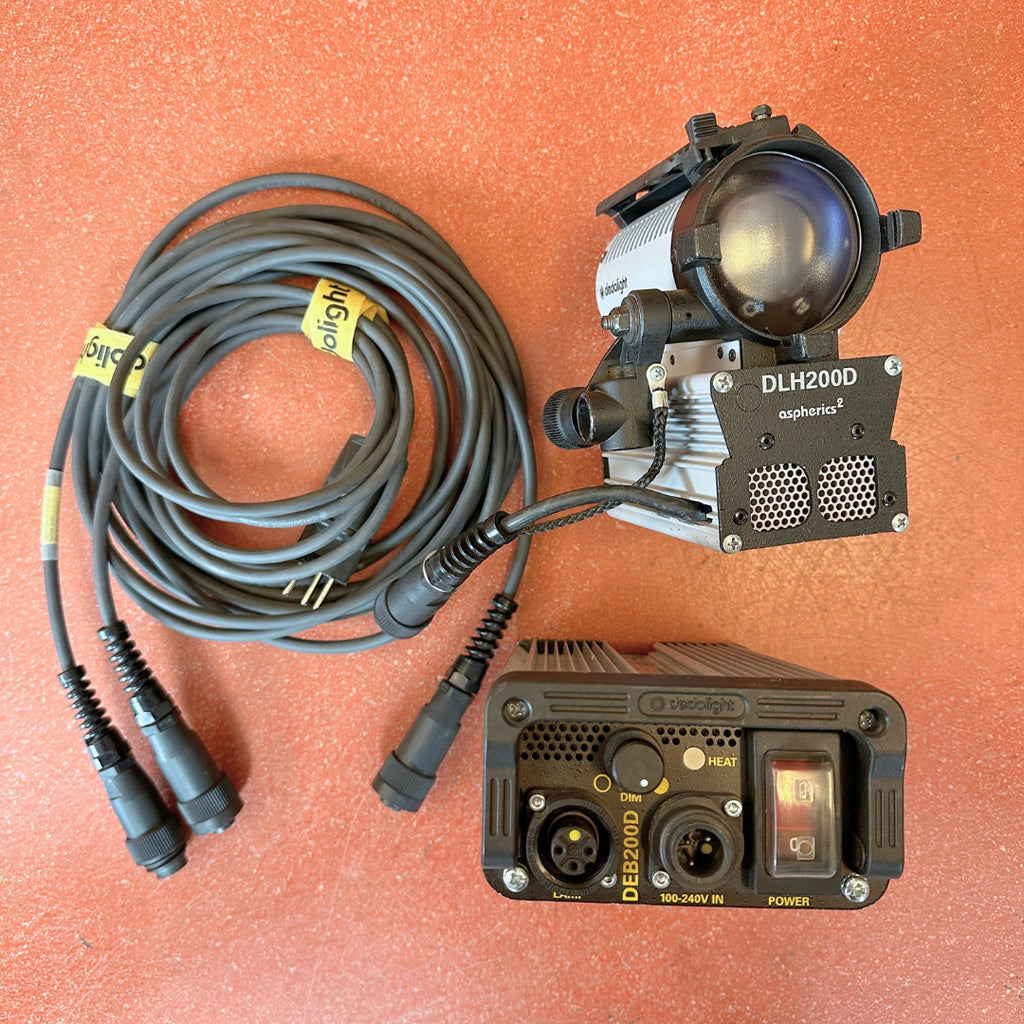 Dedolight DLH200D light head, DEB200D ballast, light head cable, light shield ring, barn door, 200W daylight lamp.